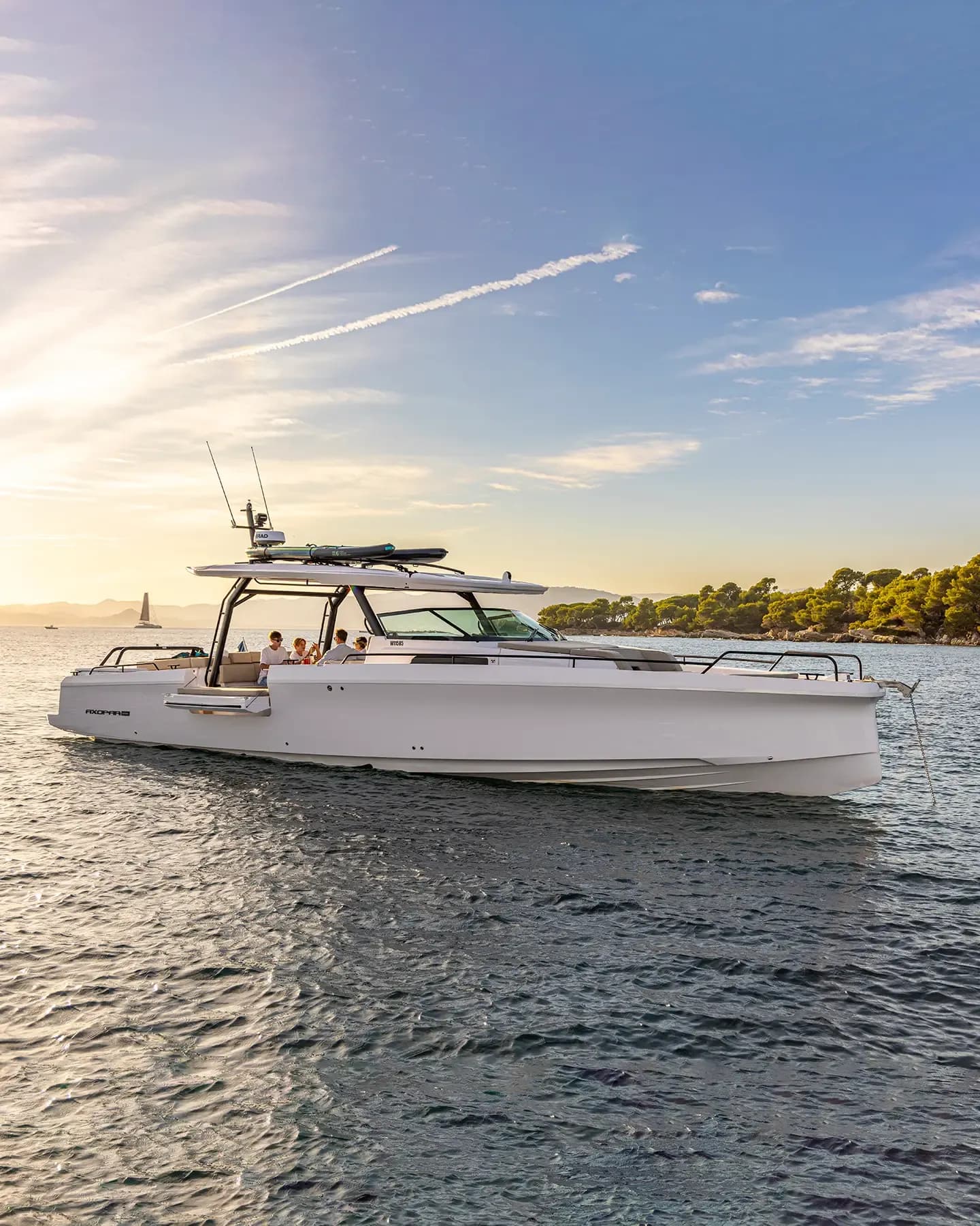 Axopar 37 Sun Top alongside a superyacht or quayside