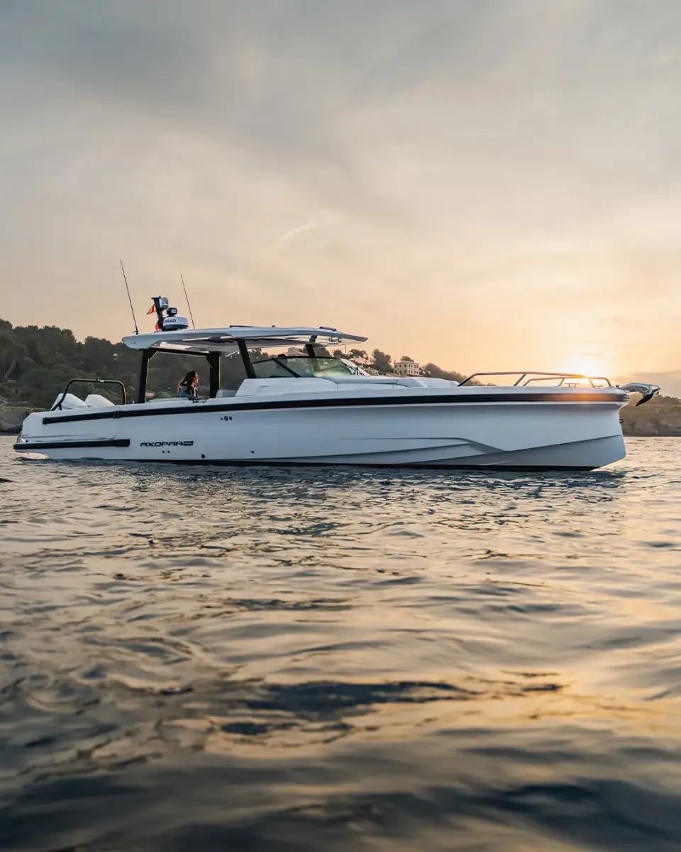 Axopar 38 Sun Top underway at speed on open water