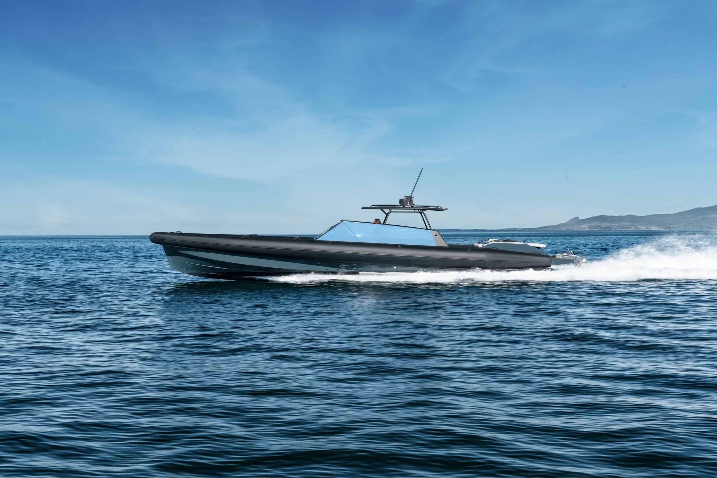 Goldfish 49 Open underway, three-quarter bow view showing open deck layout