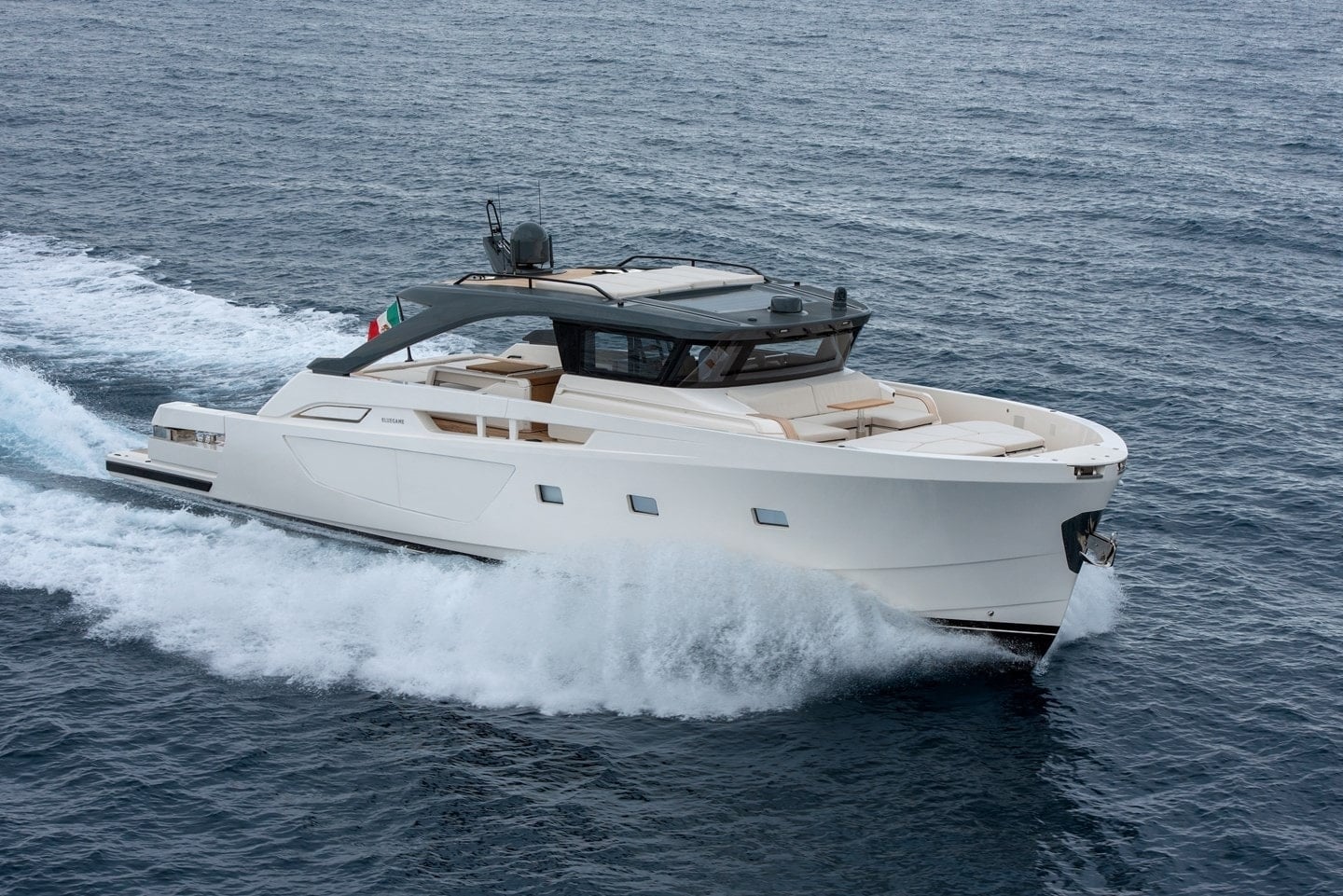 Bluegame BG74 exterior port-side view underway at sea