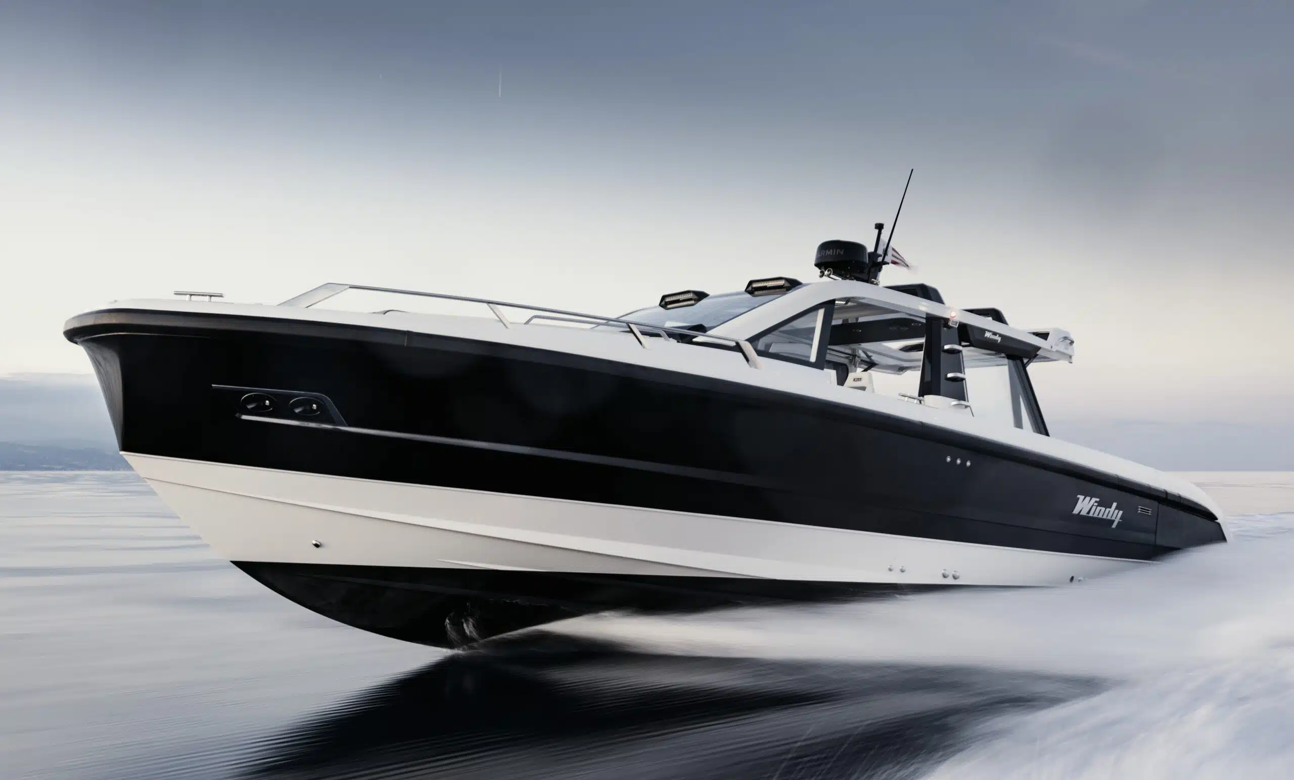 Windy SR40 underway at sea, exterior three-quarter bow view showing deep-V hull and Scandinavian lines